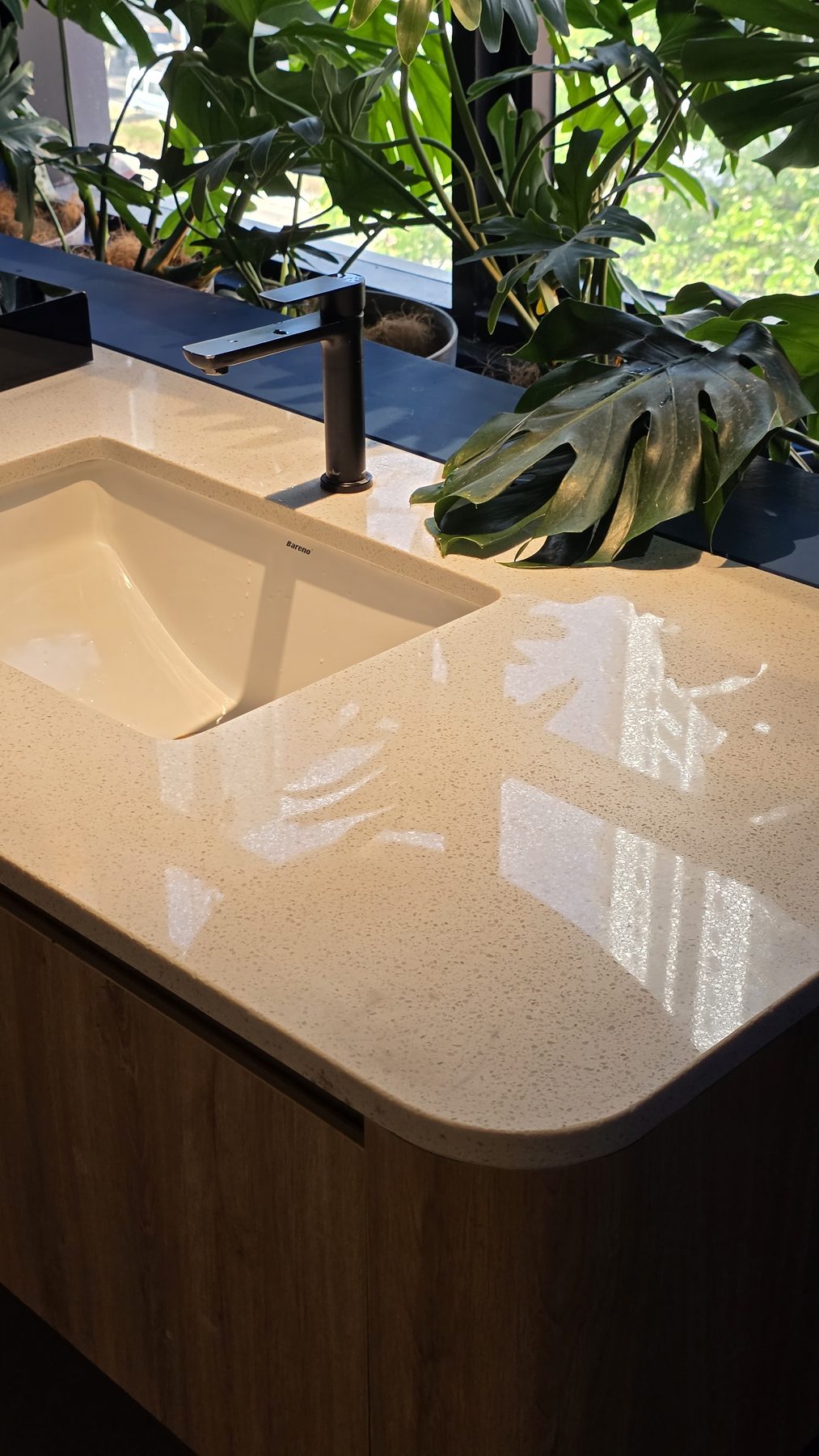 A stone counter and vanity detail seen on the tour