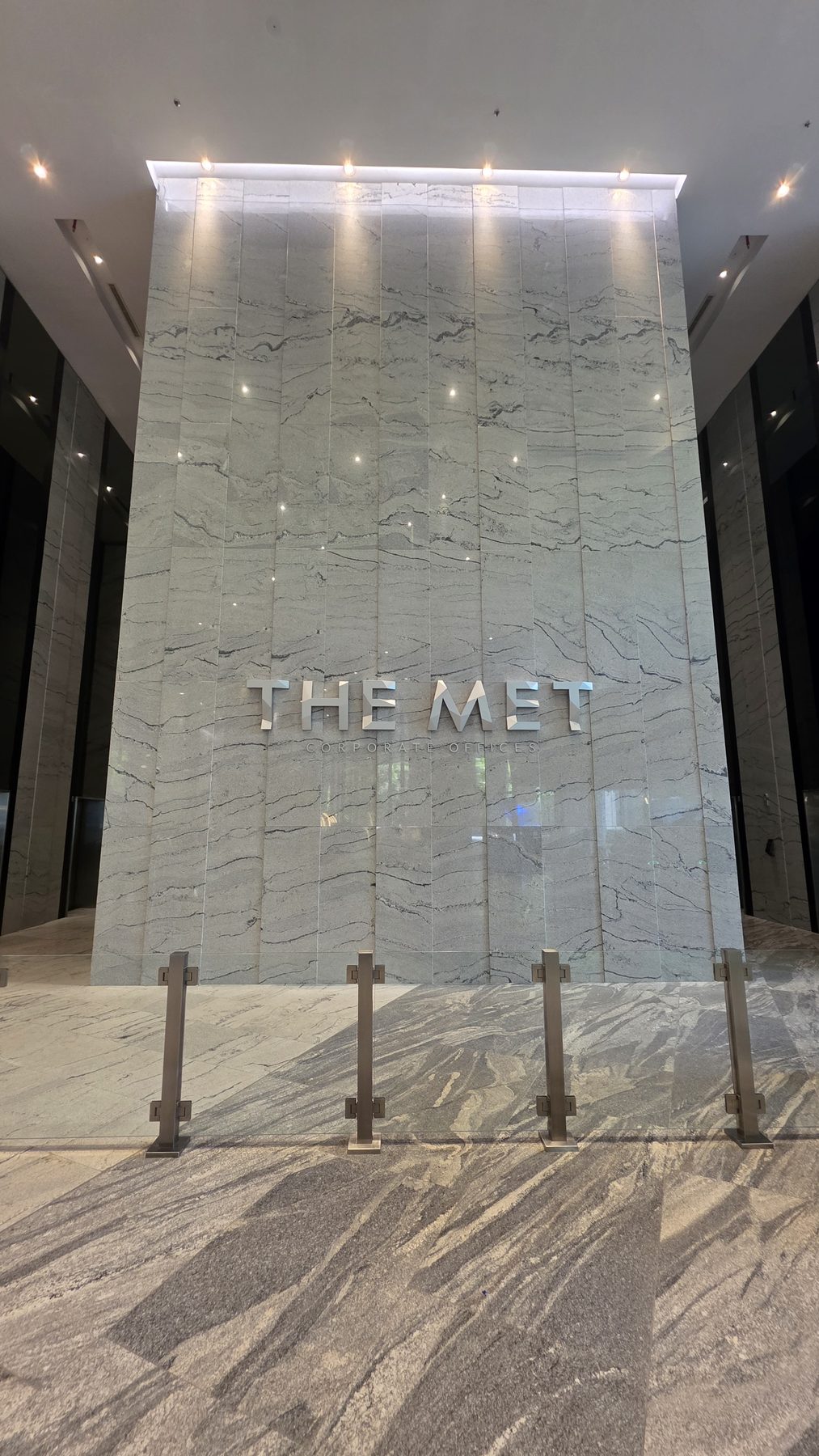 The stone feature wall at The MET Corporate Tower